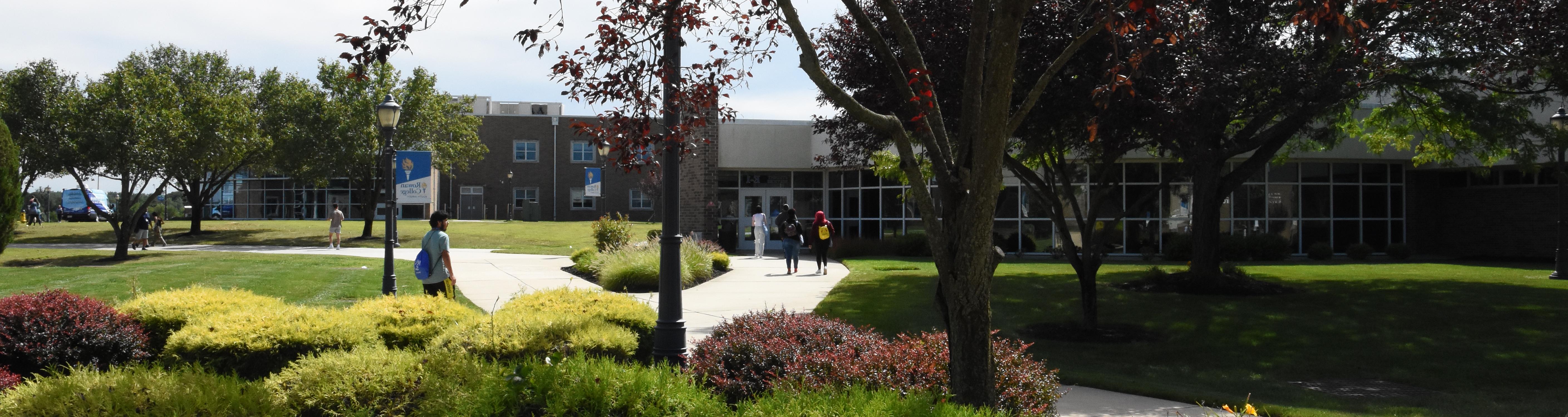 view of campus with students walking in the distance